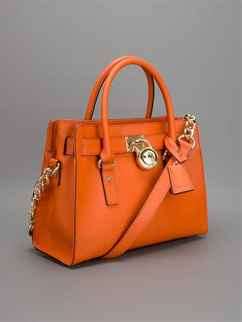 michael kors orange handbag